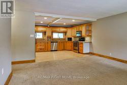 Open concept living room/kitchen. - 