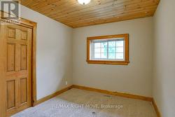 3rd bedroom; T & G pine ceiling. - 
