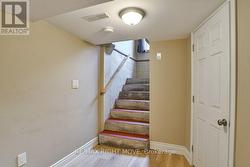 Basement foyer in front of the utility room. - 