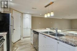 Centre island;  double sink; B/I dishwasher. - 