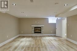 Open concept living room; gas fireplace. - 
