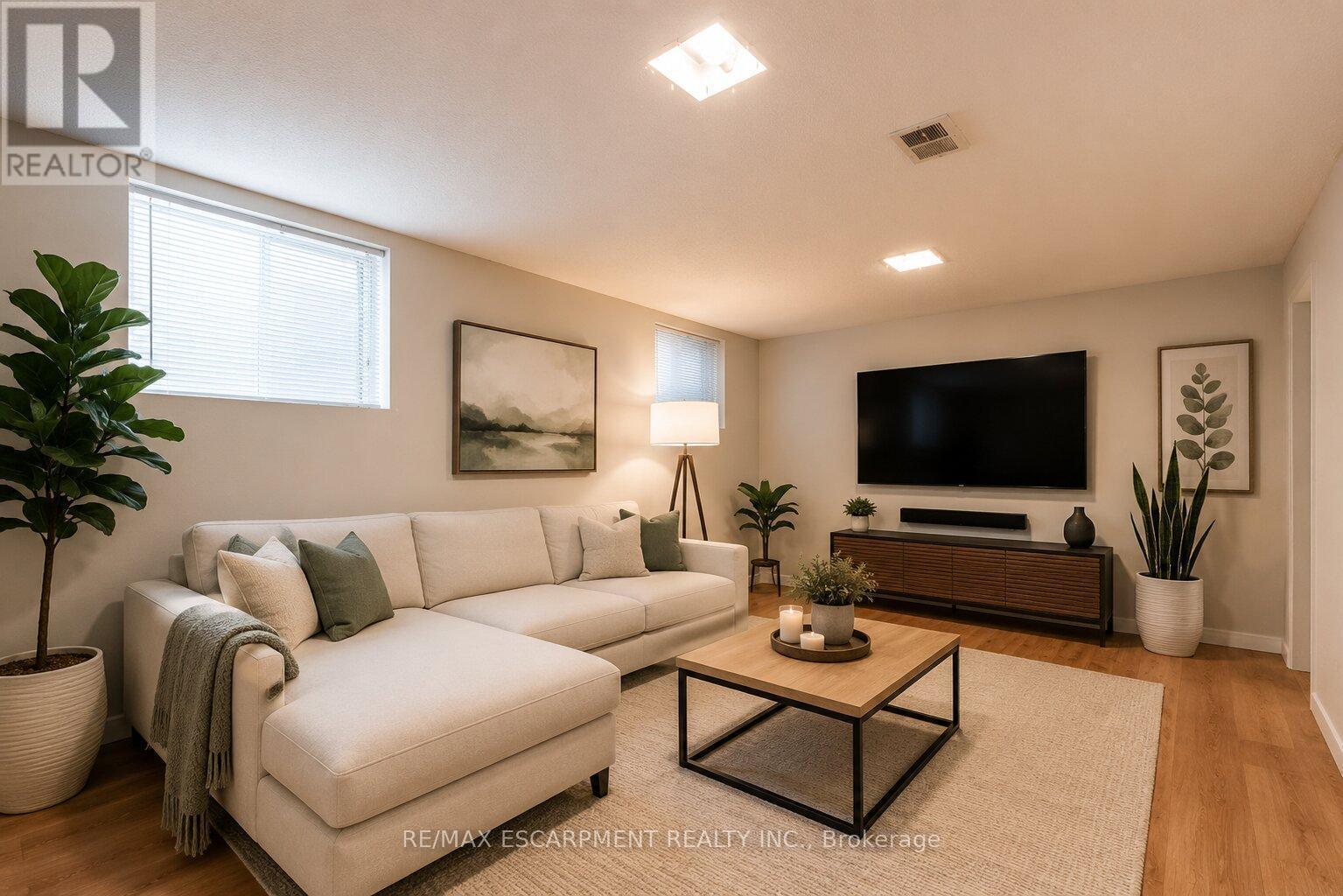VIRTUALLY STAGED - 120 Stone Church Road W, Hamilton, ON - Indoor Photo Showing Living Room