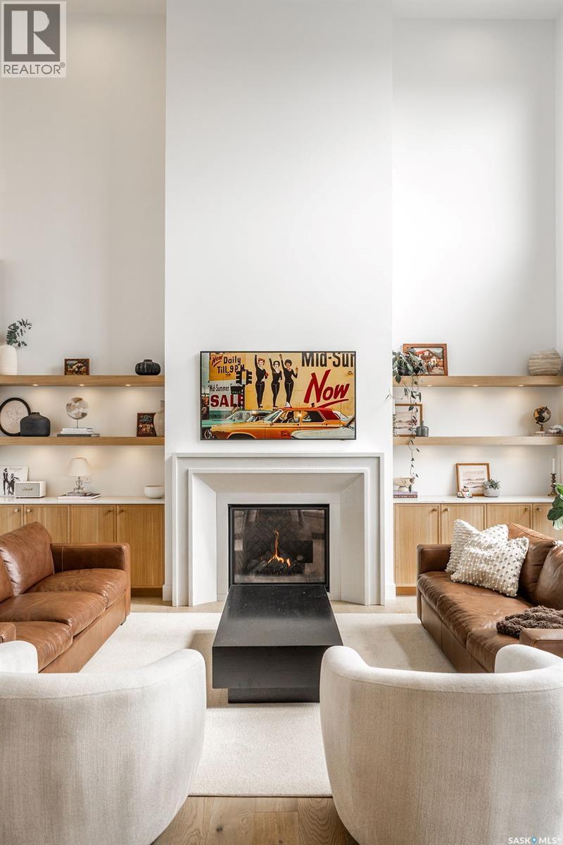 656 Pepper Bend, Saskatoon, SK - Indoor Photo Showing Living Room With Fireplace