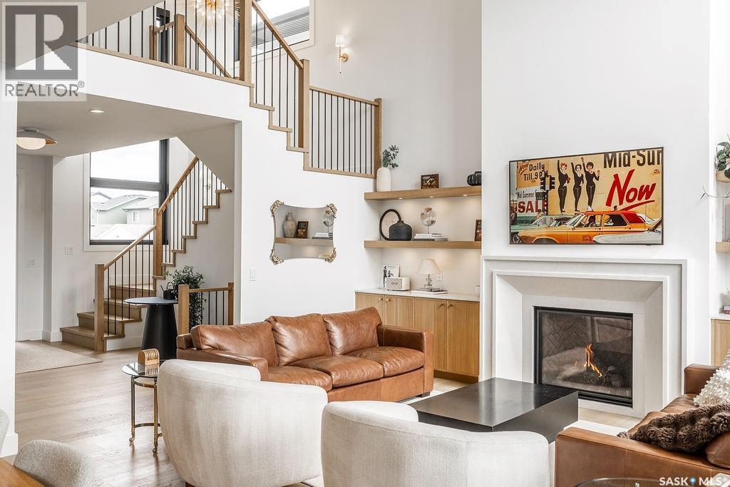 656 Pepper Bend, Saskatoon, SK - Indoor Photo Showing Living Room With Fireplace