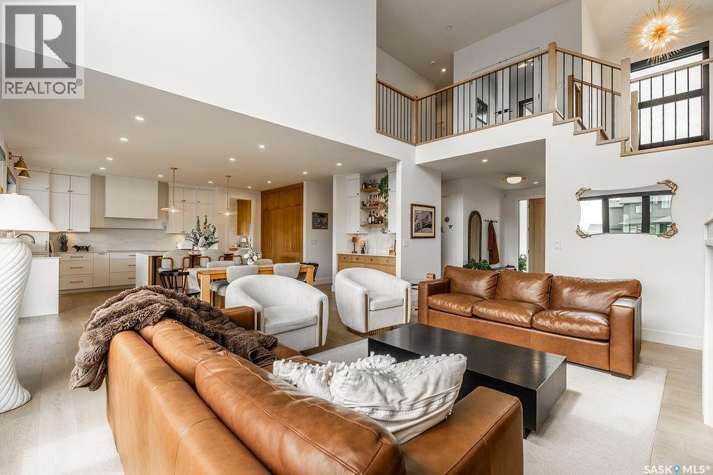 656 Pepper Bend, Saskatoon, SK - Indoor Photo Showing Living Room With Fireplace