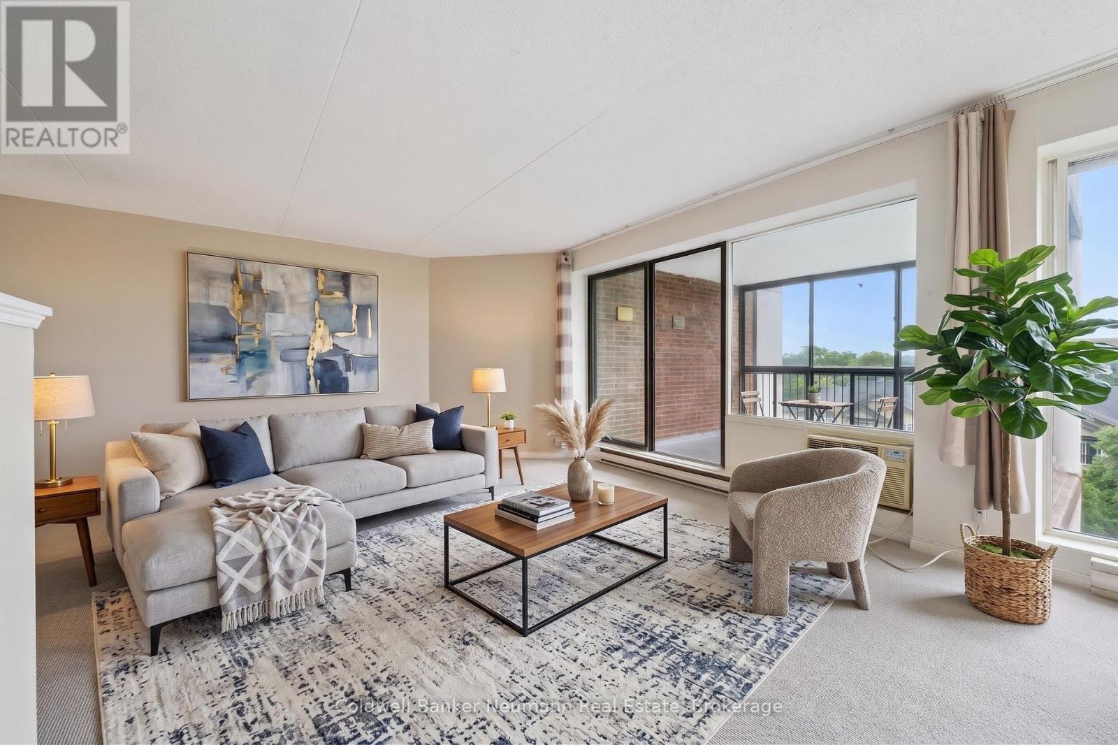 Virtually Staged - 708 - 22 Marilyn Drive, Guelph (Riverside Park), ON - Indoor Photo Showing Living Room