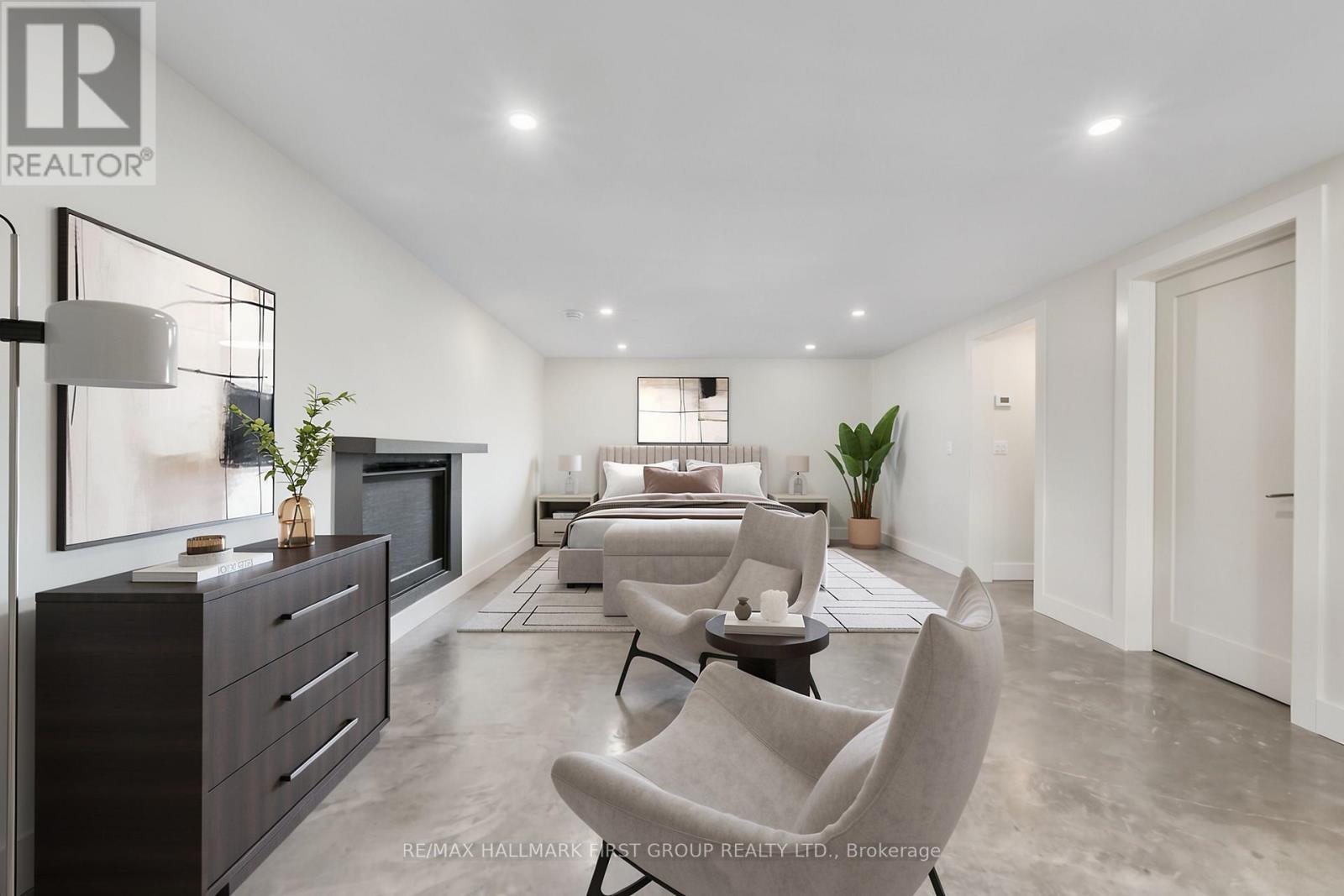 4566 Harwood Road, Hamilton Township, ON - Indoor Photo Showing Living Room With Fireplace