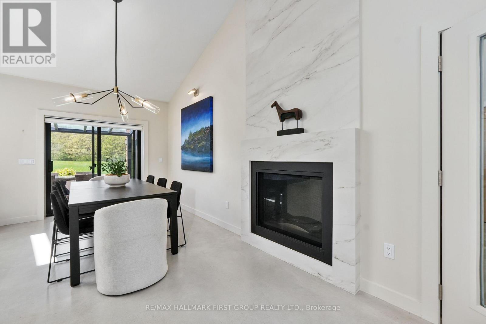 4566 Harwood Road, Hamilton Township, ON - Indoor With Fireplace