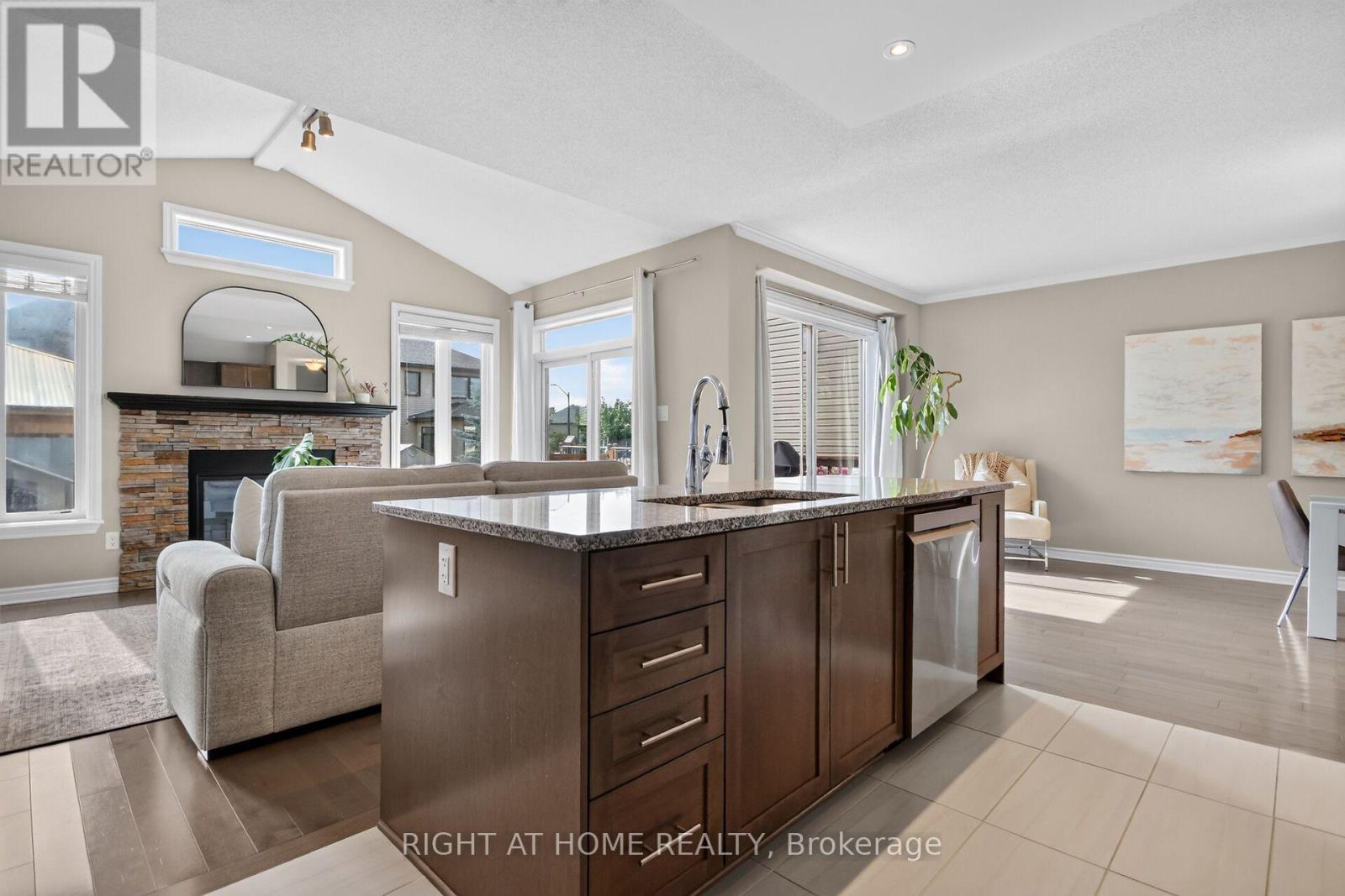 207 Mareth Way, Ottawa, ON - Indoor Photo Showing Kitchen With Fireplace