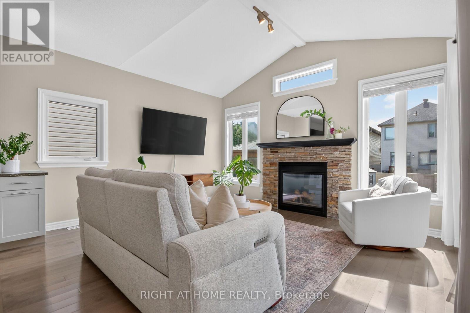 207 Mareth Way, Ottawa, ON - Indoor Photo Showing Living Room With Fireplace