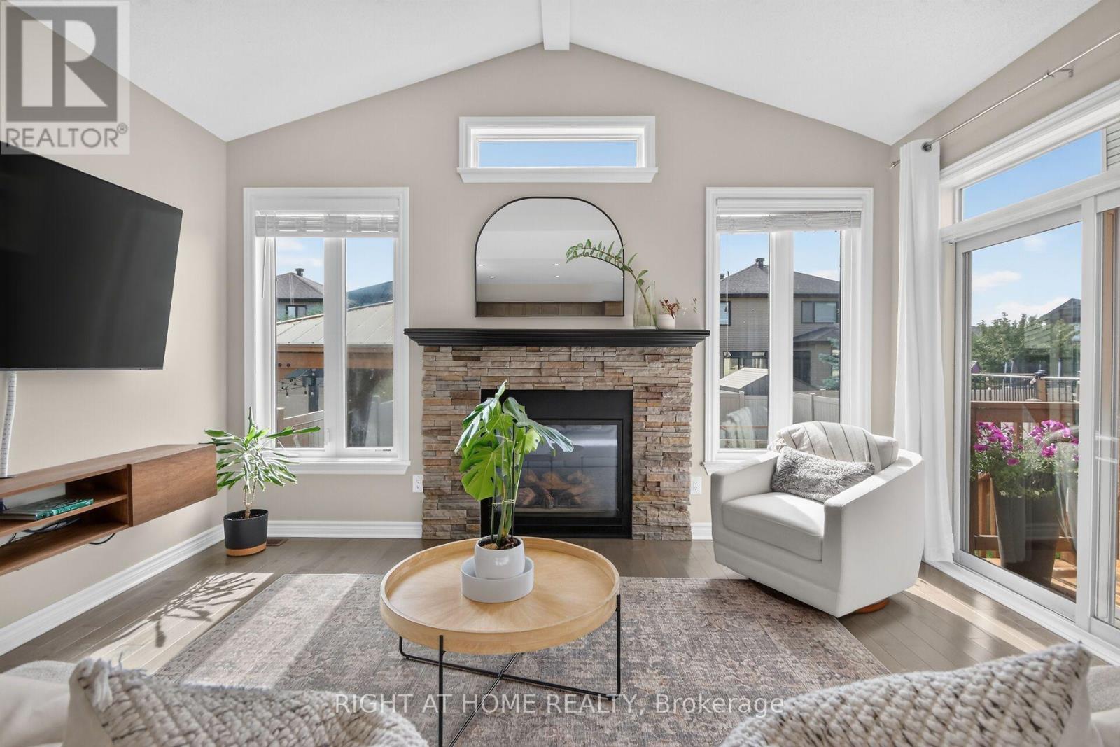 207 Mareth Way, Ottawa, ON - Indoor Photo Showing Living Room With Fireplace