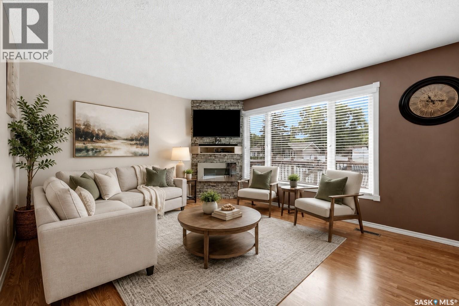 2518 7Th Avenue E, Regina, SK - Indoor Photo Showing Living Room With Fireplace