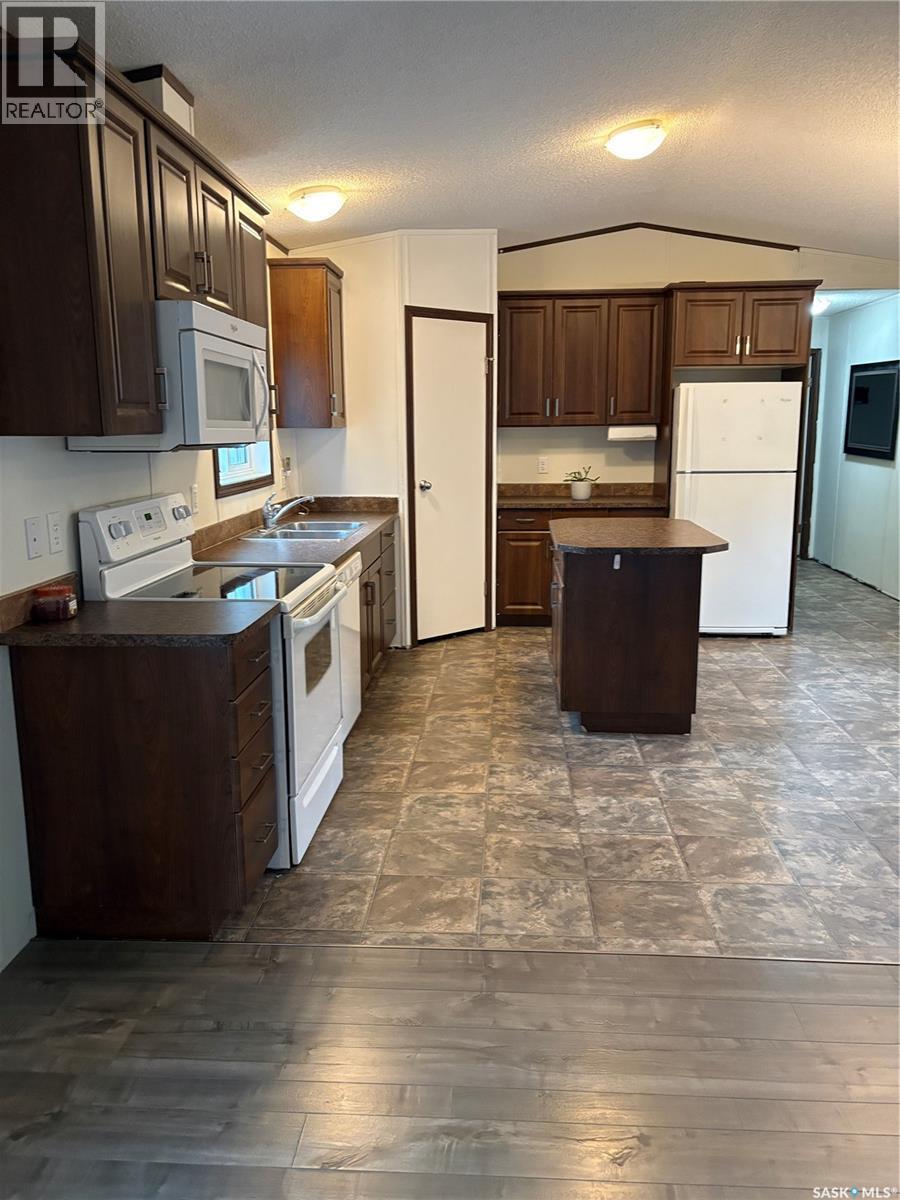 69 Railway Avenue, Calder, SK - Indoor Photo Showing Kitchen