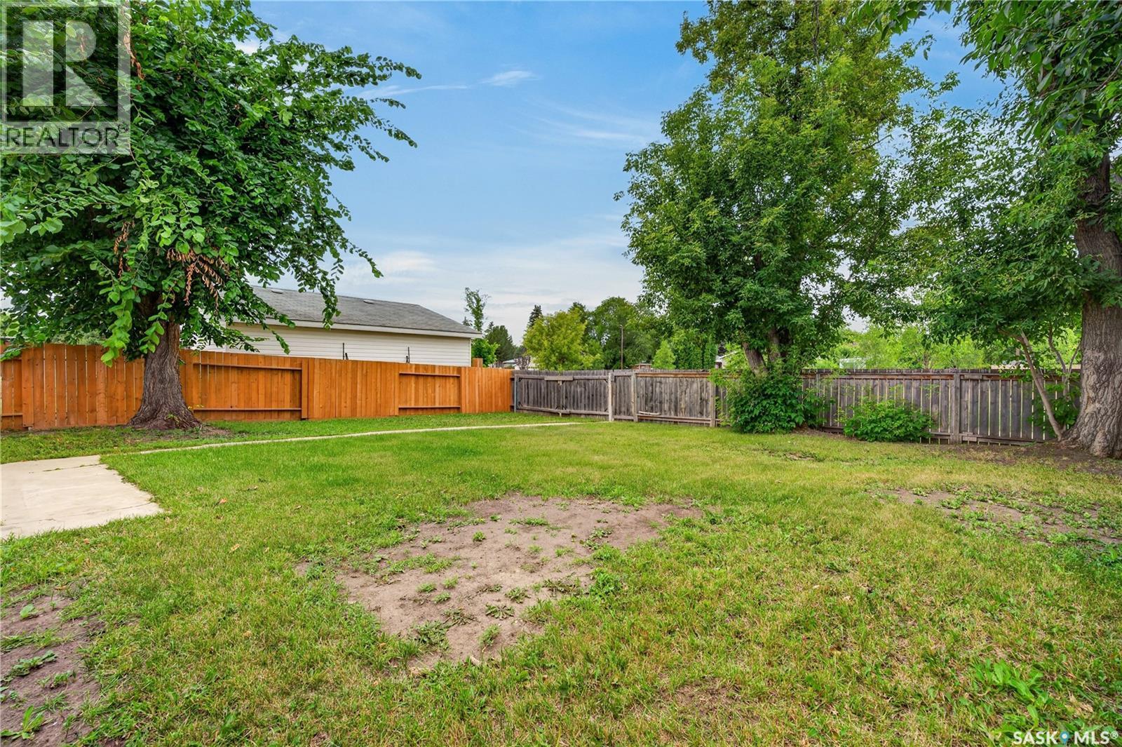214 Fisher Crescent, Saskatoon, SK - Outdoor With Backyard