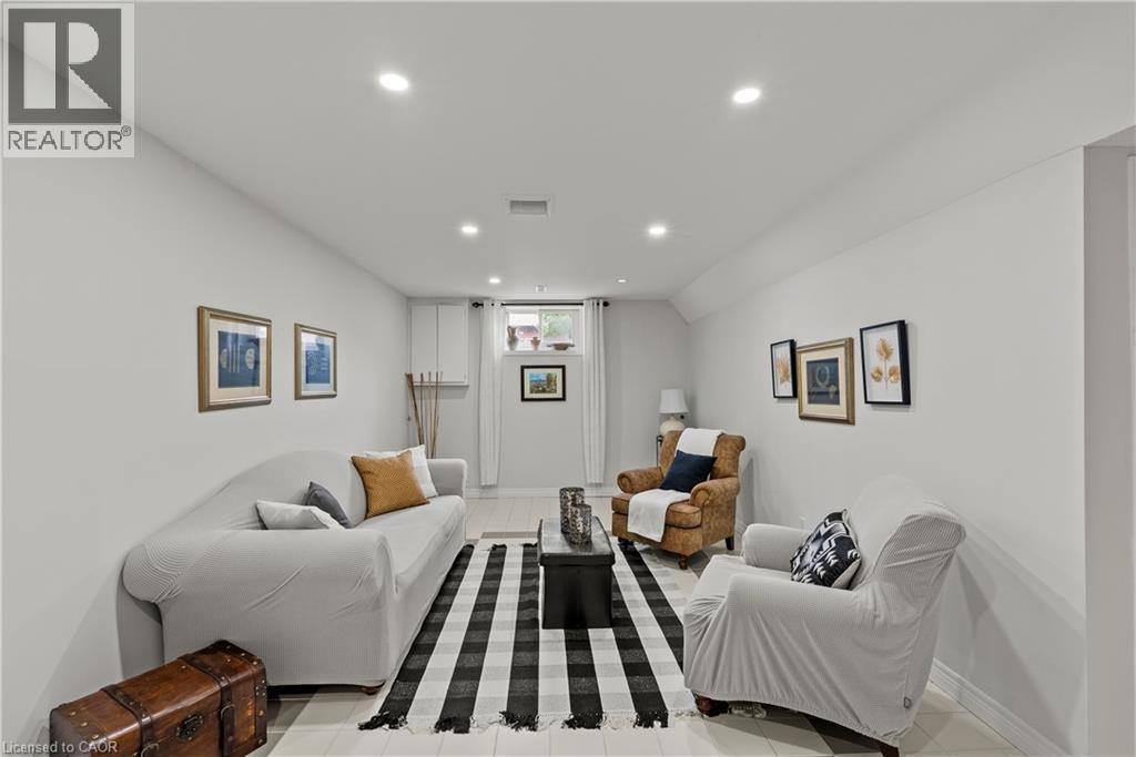 Recessed ceiling lighting, light gray wall finishes, light-toned flooring, and a window with white blinds - 87 Monte Drive, Hamilton, ON - Indoor Photo Showing Bedroom