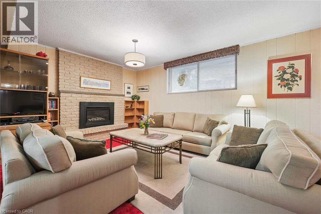 30 Shuh Avenue, Kitchener, ON - Indoor Photo Showing Living Room With Fireplace