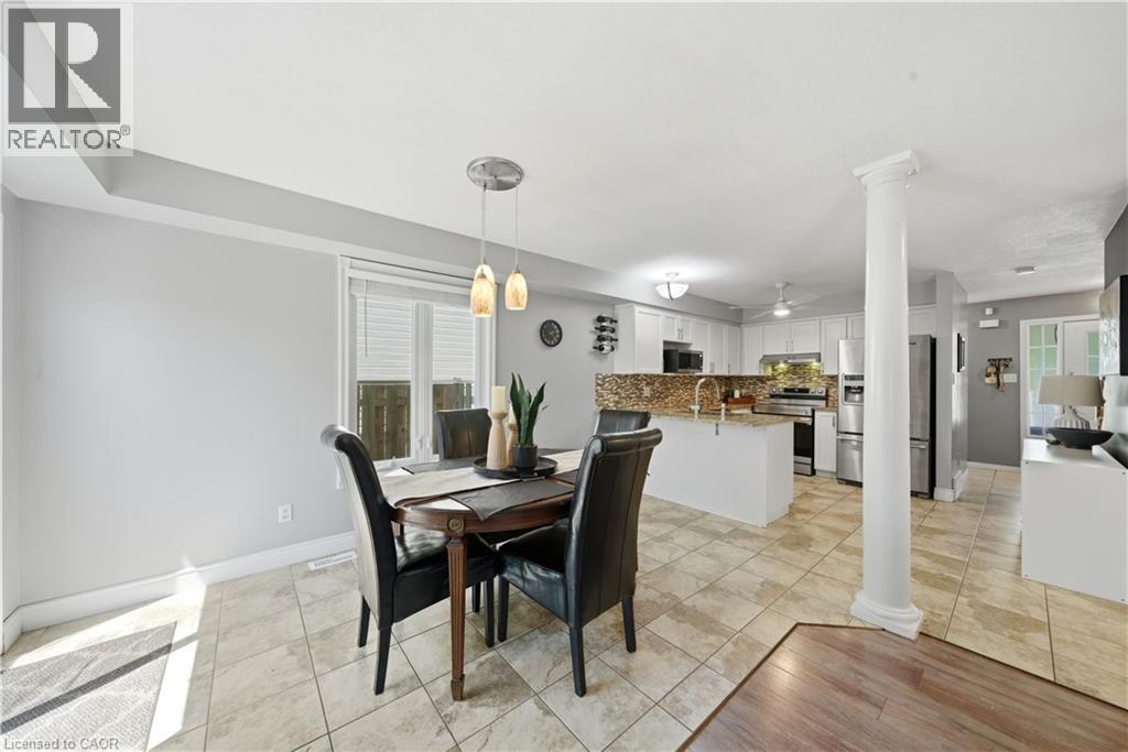 Open-concept kitchen and dining area featuring tile flooring - 784 Butternut Avenue, Waterloo, ON - Indoor Photo Showing Dining Room
