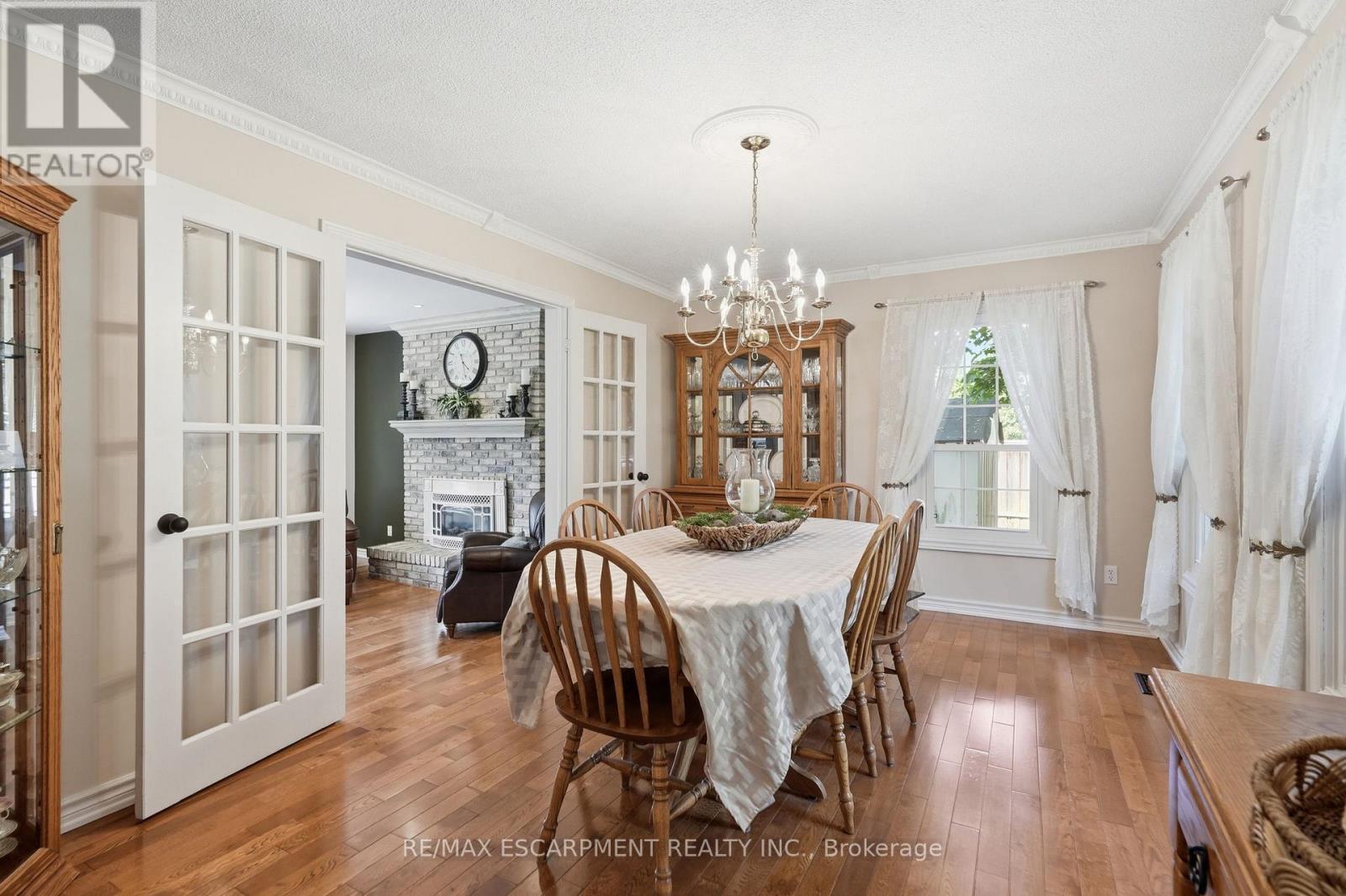 1 Meander Close, Hamilton, ON - Indoor Photo Showing Dining Room With Fireplace