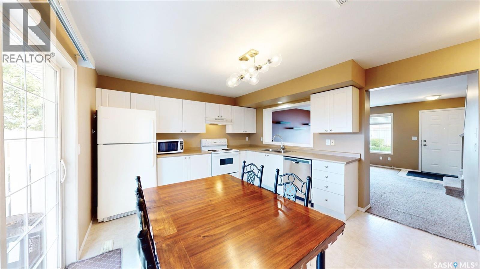 13 809 Kristjanson Road, Saskatoon, SK - Indoor Photo Showing Kitchen With Double Sink