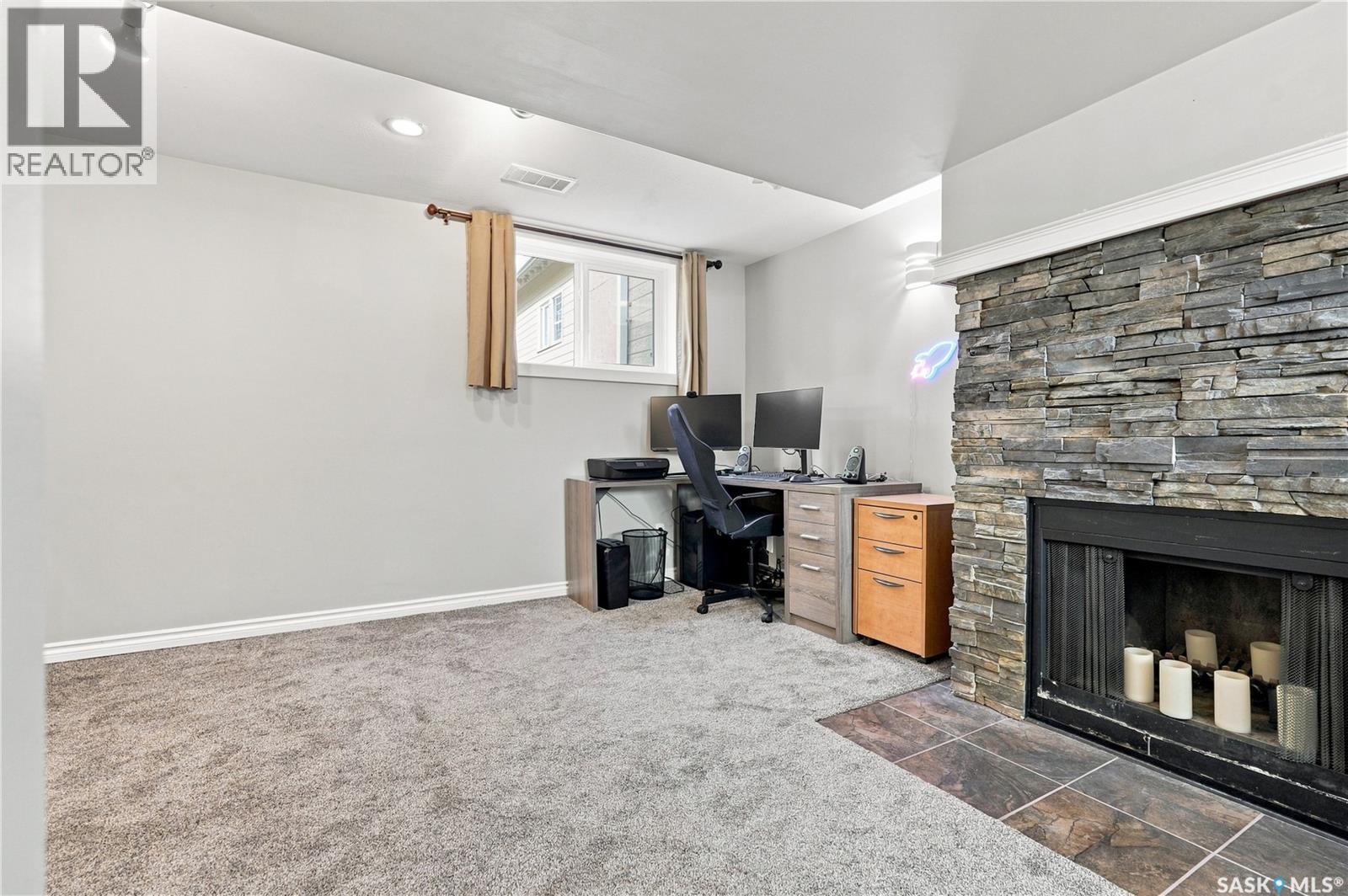 317 Simon Fraser Crescent, Saskatoon, SK - Indoor With Fireplace