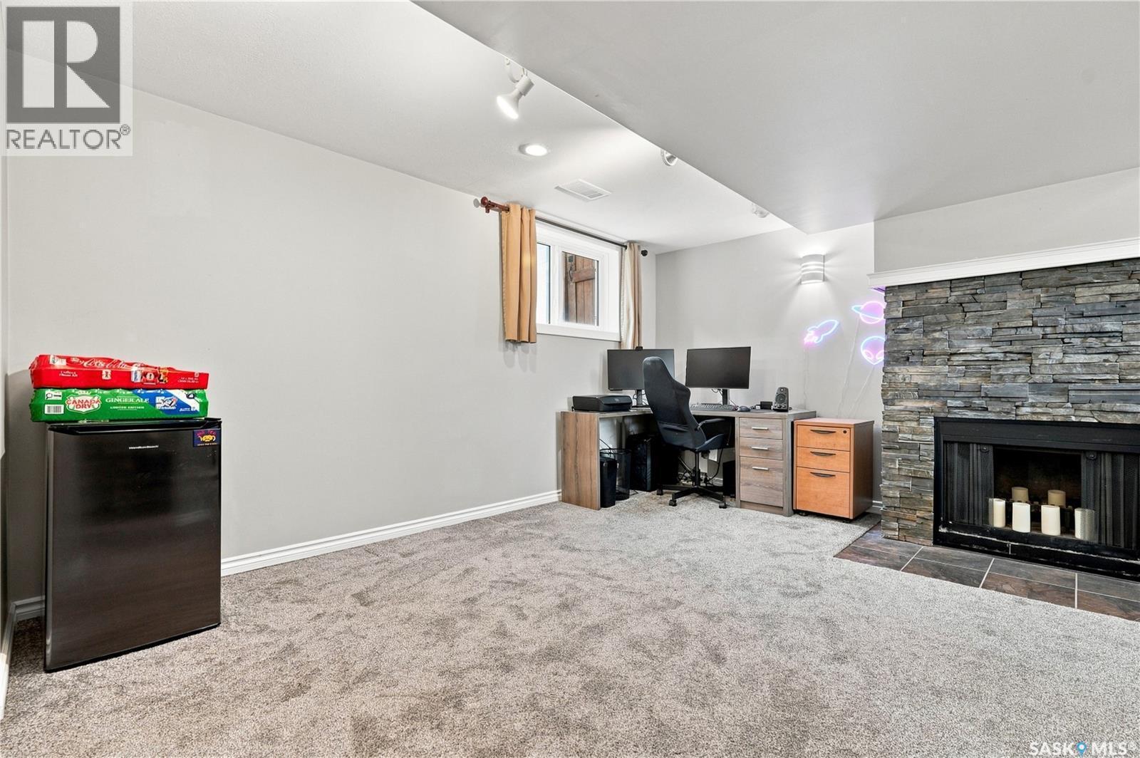 317 Simon Fraser Crescent, Saskatoon, SK - Indoor With Fireplace