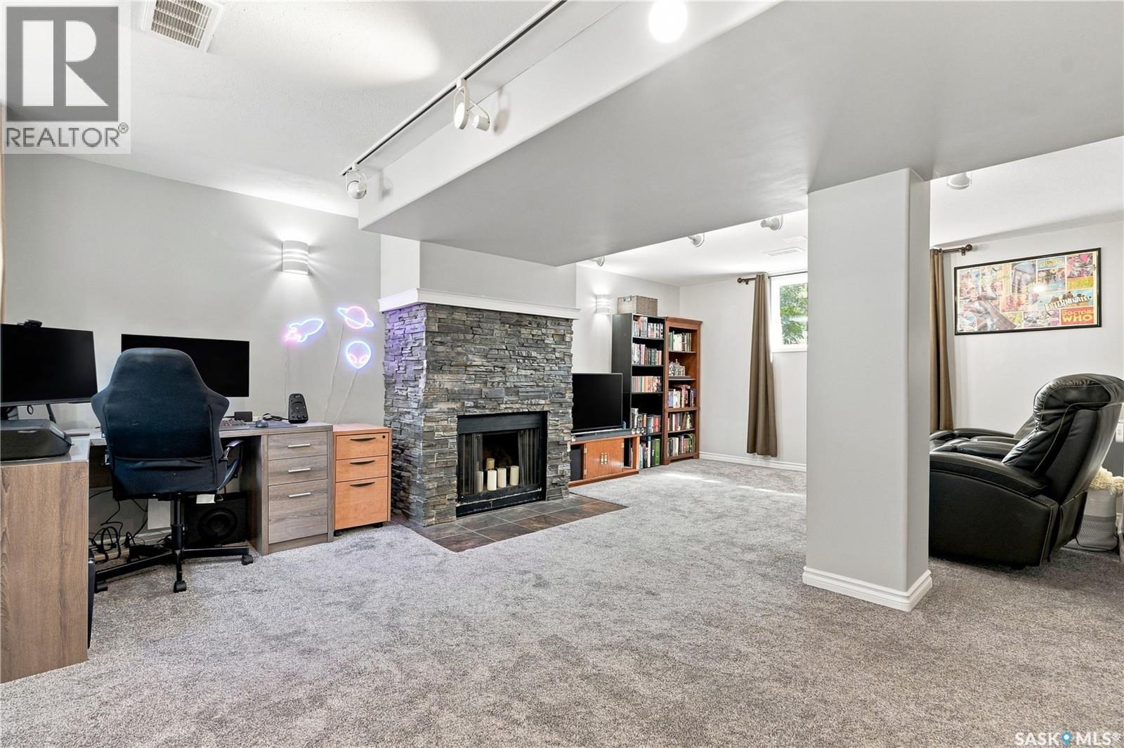 317 Simon Fraser Crescent, Saskatoon, SK - Indoor With Fireplace
