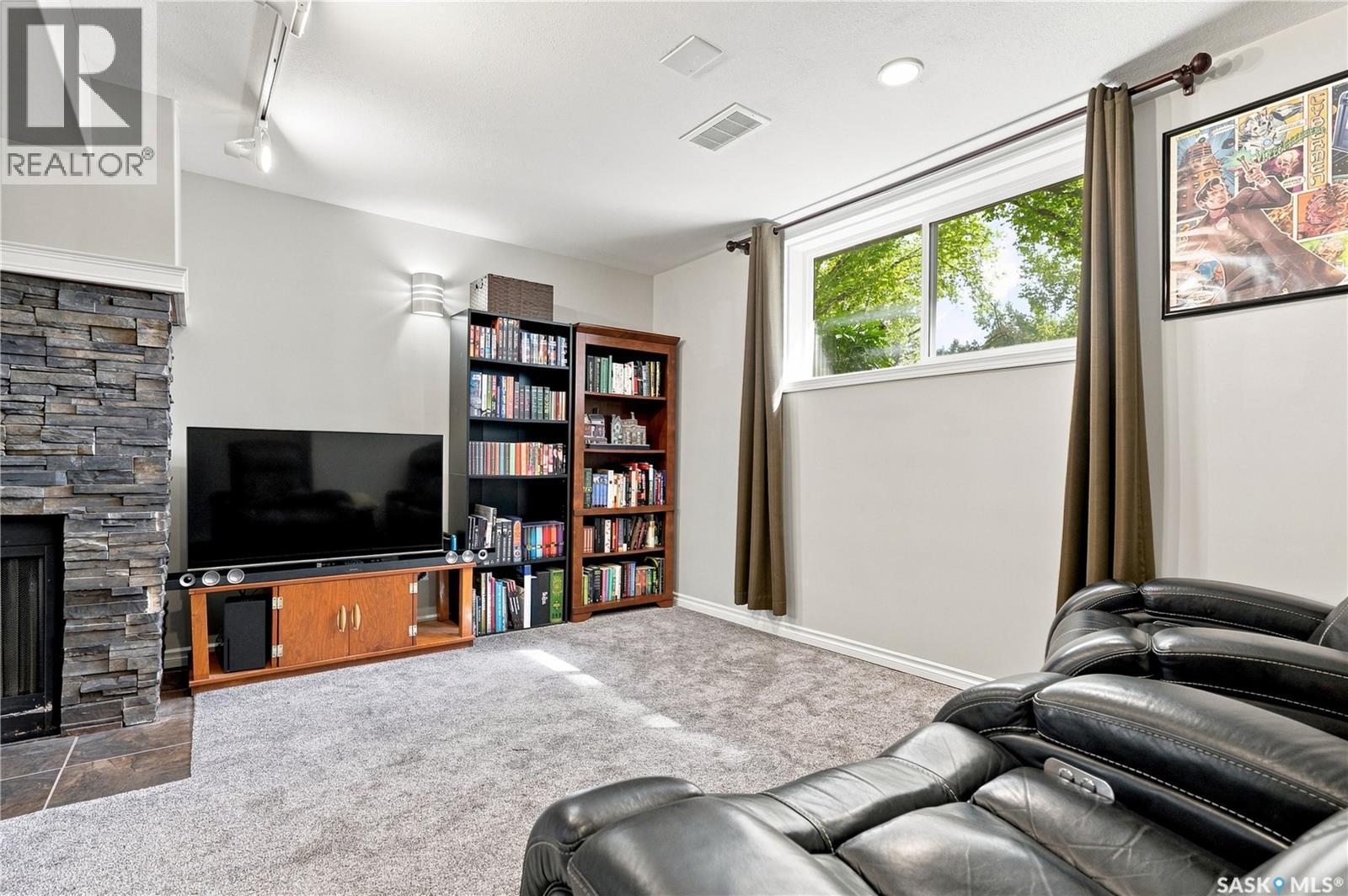 317 Simon Fraser Crescent, Saskatoon, SK - Indoor With Fireplace
