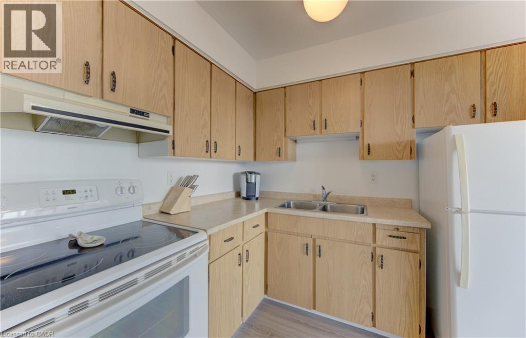 24 Midland Drive Unit# 403, Kitchener, ON - Indoor Photo Showing Kitchen With Double Sink