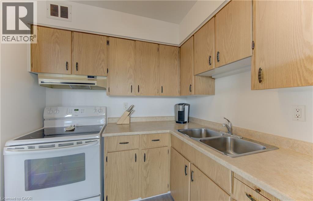 24 Midland Drive Unit# 403, Kitchener, ON - Indoor Photo Showing Kitchen With Double Sink