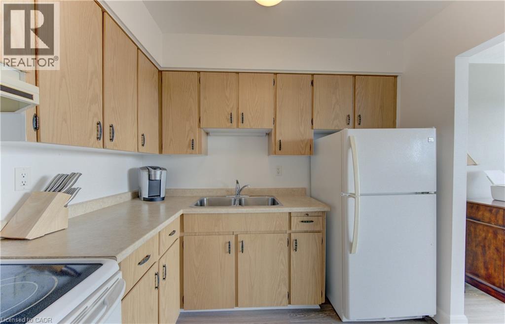 24 Midland Drive Unit# 403, Kitchener, ON - Indoor Photo Showing Kitchen With Double Sink