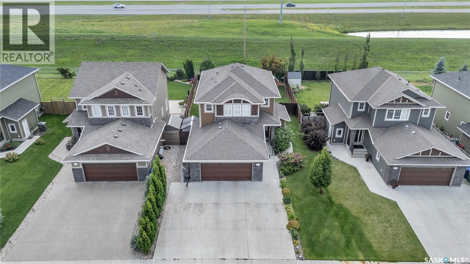 422 Pichler Crescent, Saskatoon, SK - Outdoor With Deck Patio Veranda With Facade