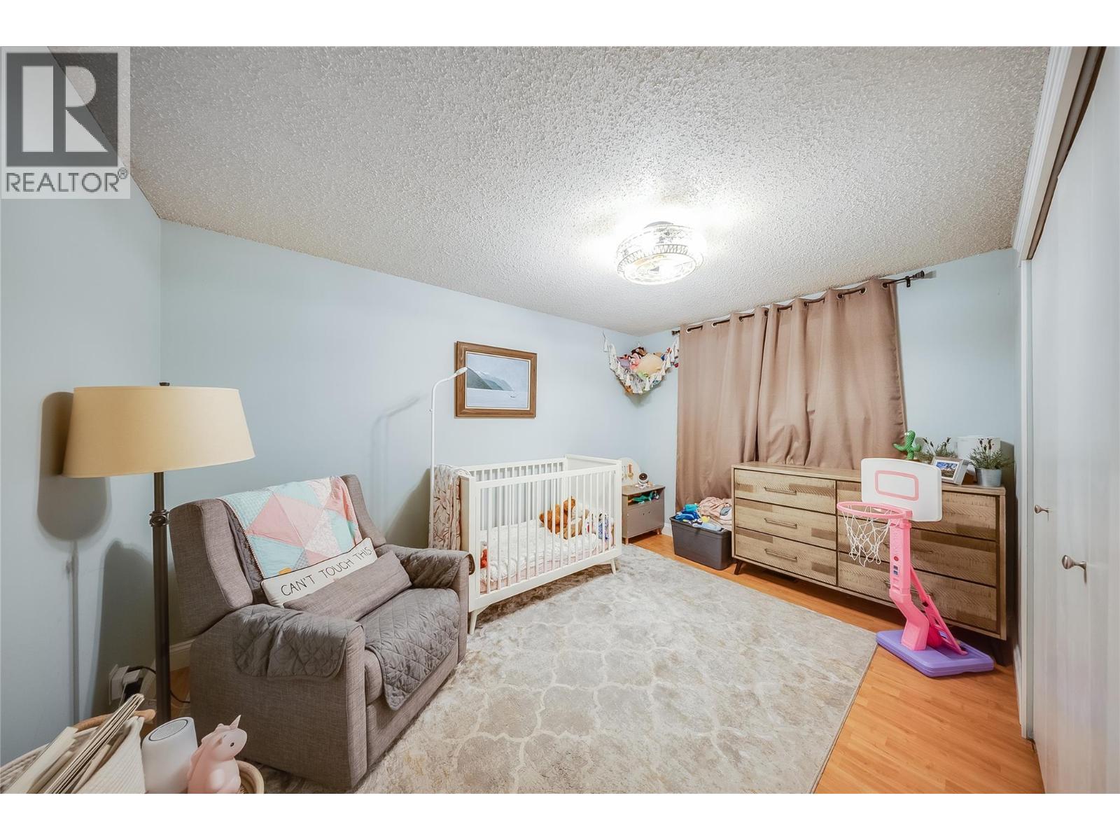 314 Webster Road, Fruitvale, BC - Indoor Photo Showing Bedroom