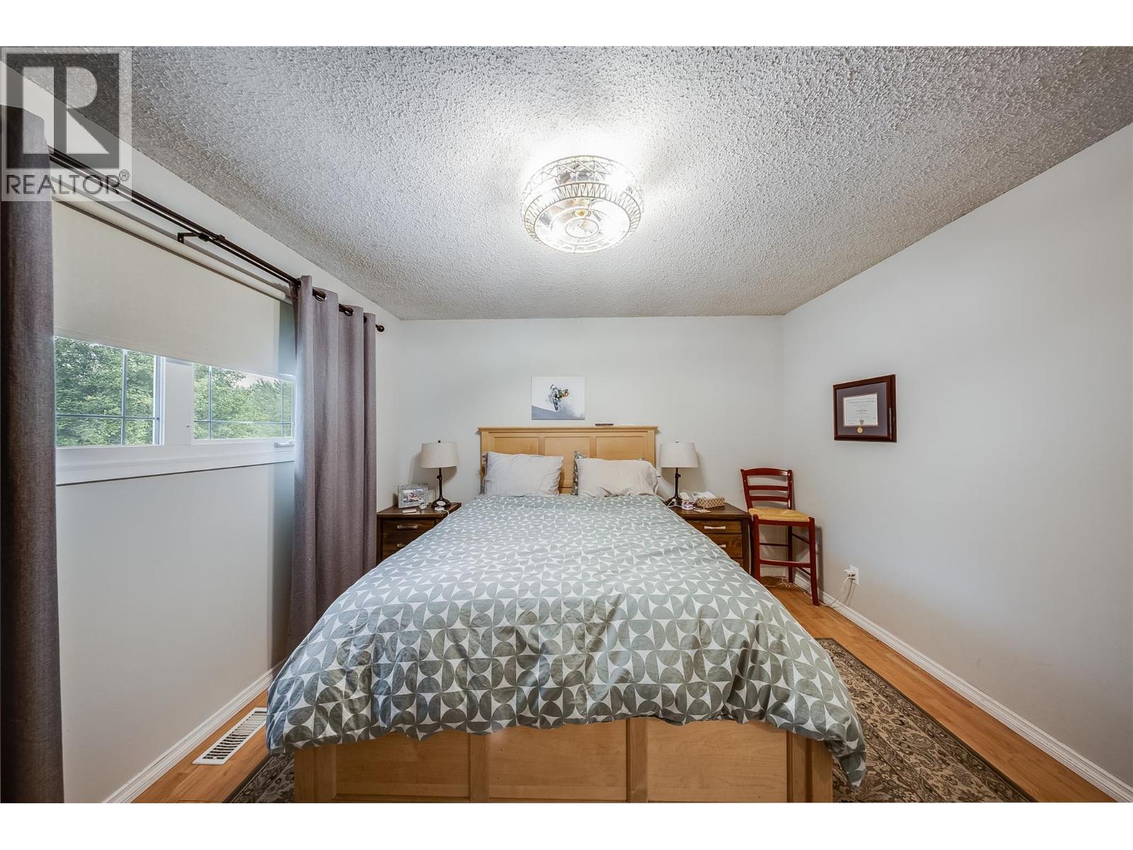 314 Webster Road, Fruitvale, BC - Indoor Photo Showing Bedroom