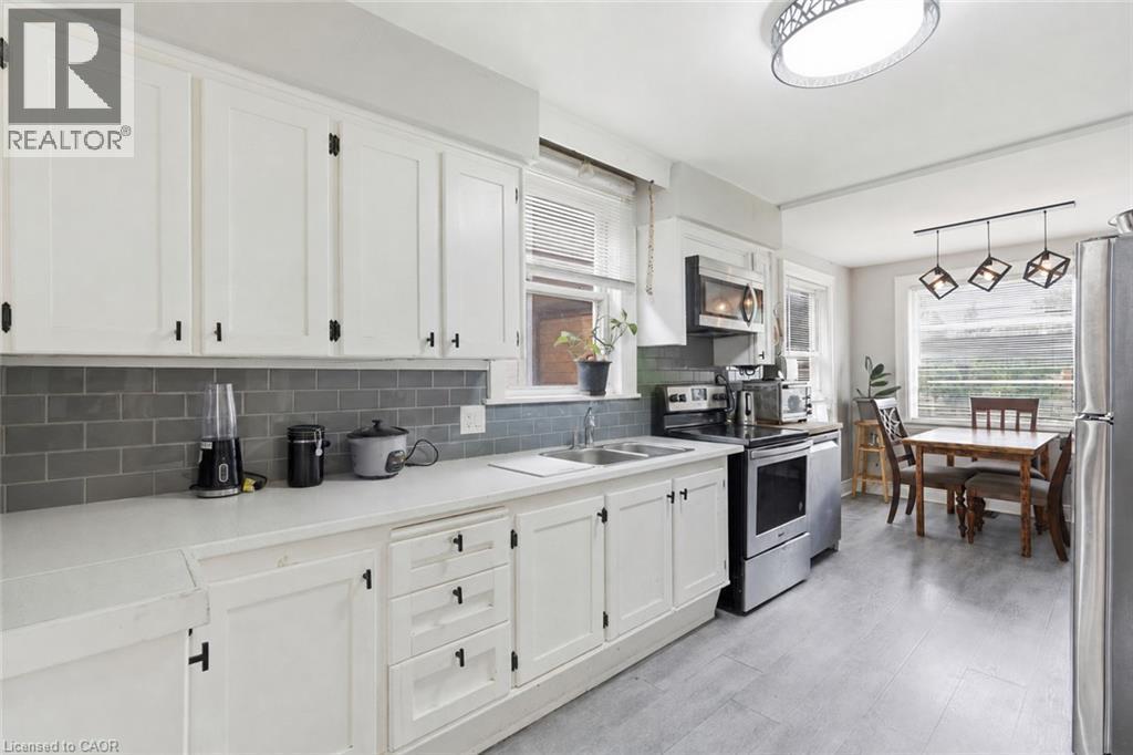 35 Centennial Parkway S, Hamilton, ON - Indoor Photo Showing Kitchen With Double Sink