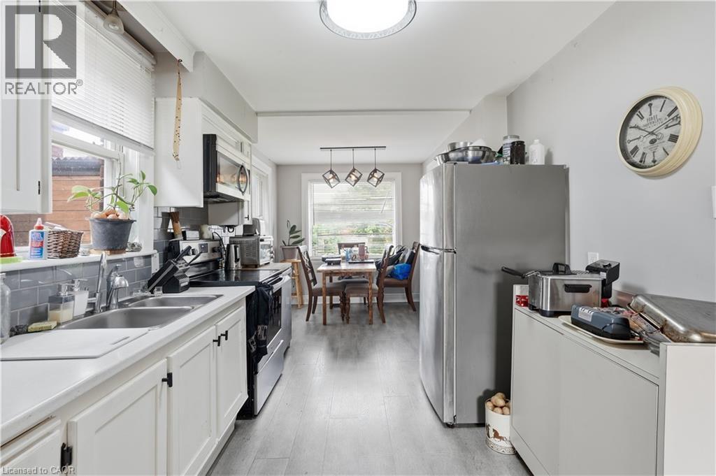 35 Centennial Parkway S, Hamilton, ON - Indoor Photo Showing Kitchen With Double Sink