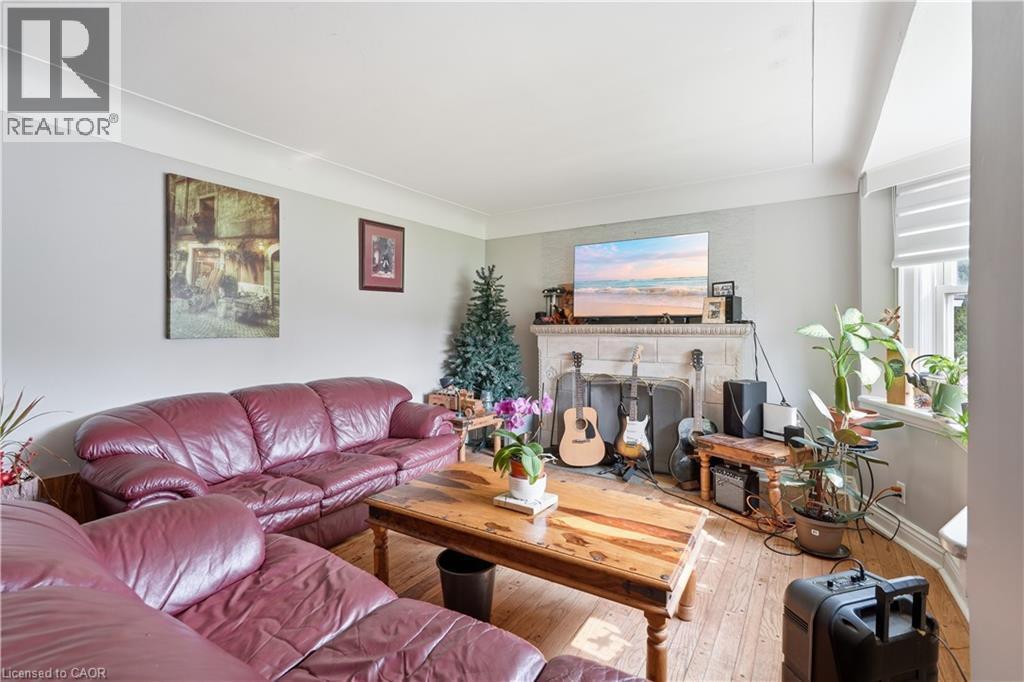 35 Centennial Parkway S, Hamilton, ON - Indoor Photo Showing Living Room With Fireplace
