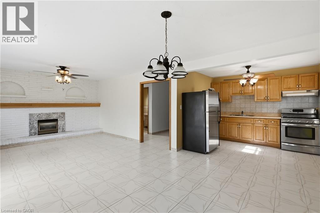 948 Stone Church Road E, Hamilton, ON - Indoor Photo Showing Kitchen With Fireplace