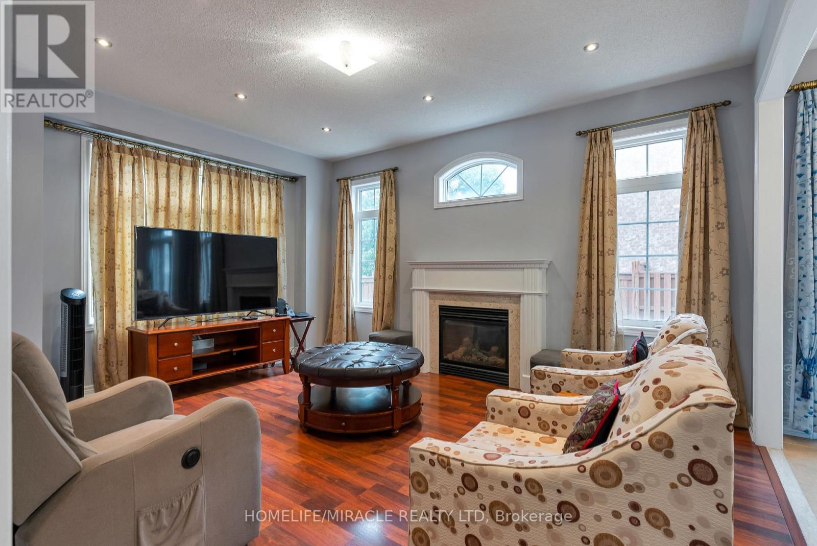 9 Peridot Road, Brampton, ON - Indoor Photo Showing Living Room With Fireplace