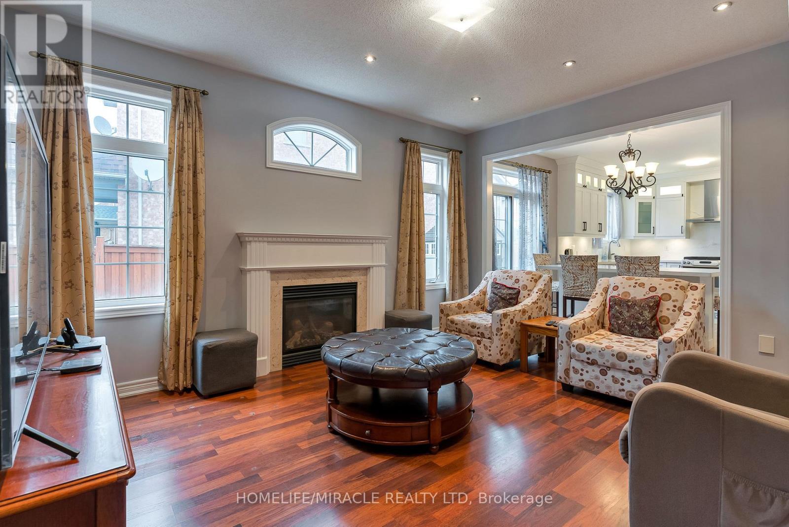 9 Peridot Road, Brampton, ON - Indoor Photo Showing Living Room With Fireplace