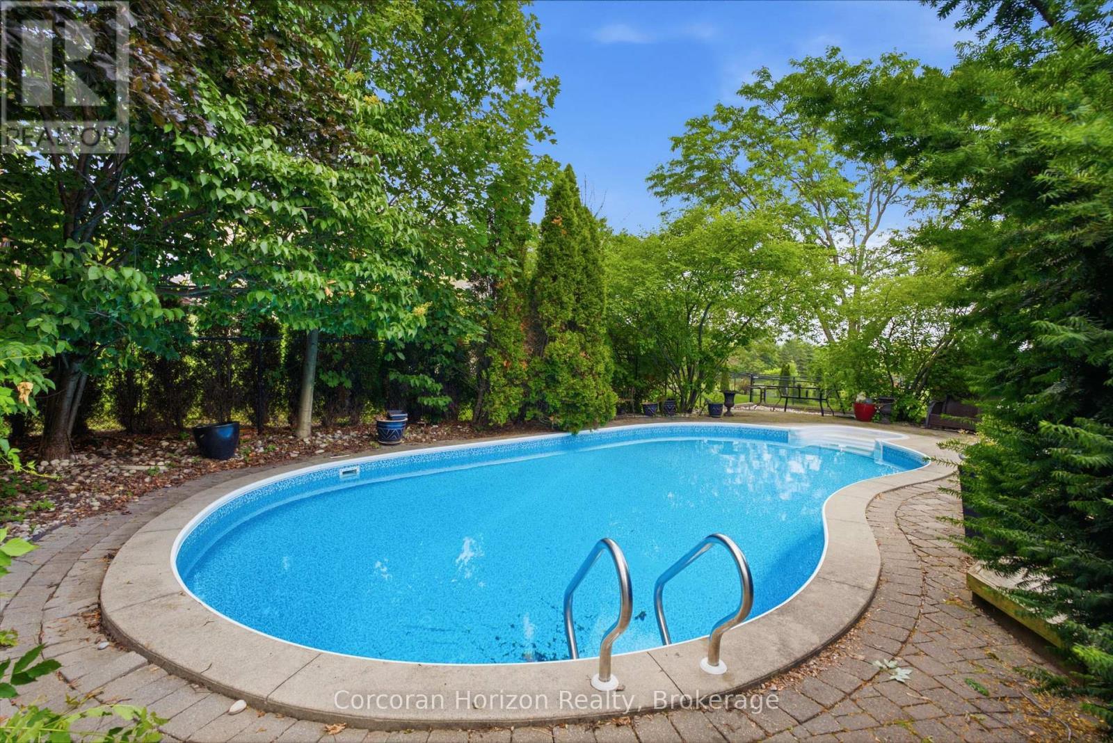 131 Huntingwood Avenue, Hamilton (Dundas), ON - Outdoor With In Ground Pool With Backyard