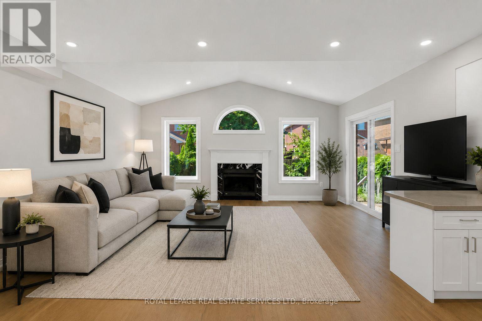 Photo is Virtually Staged - 3955 Foxwood Avenue, Mississauga, ON - Indoor Photo Showing Living Room With Fireplace