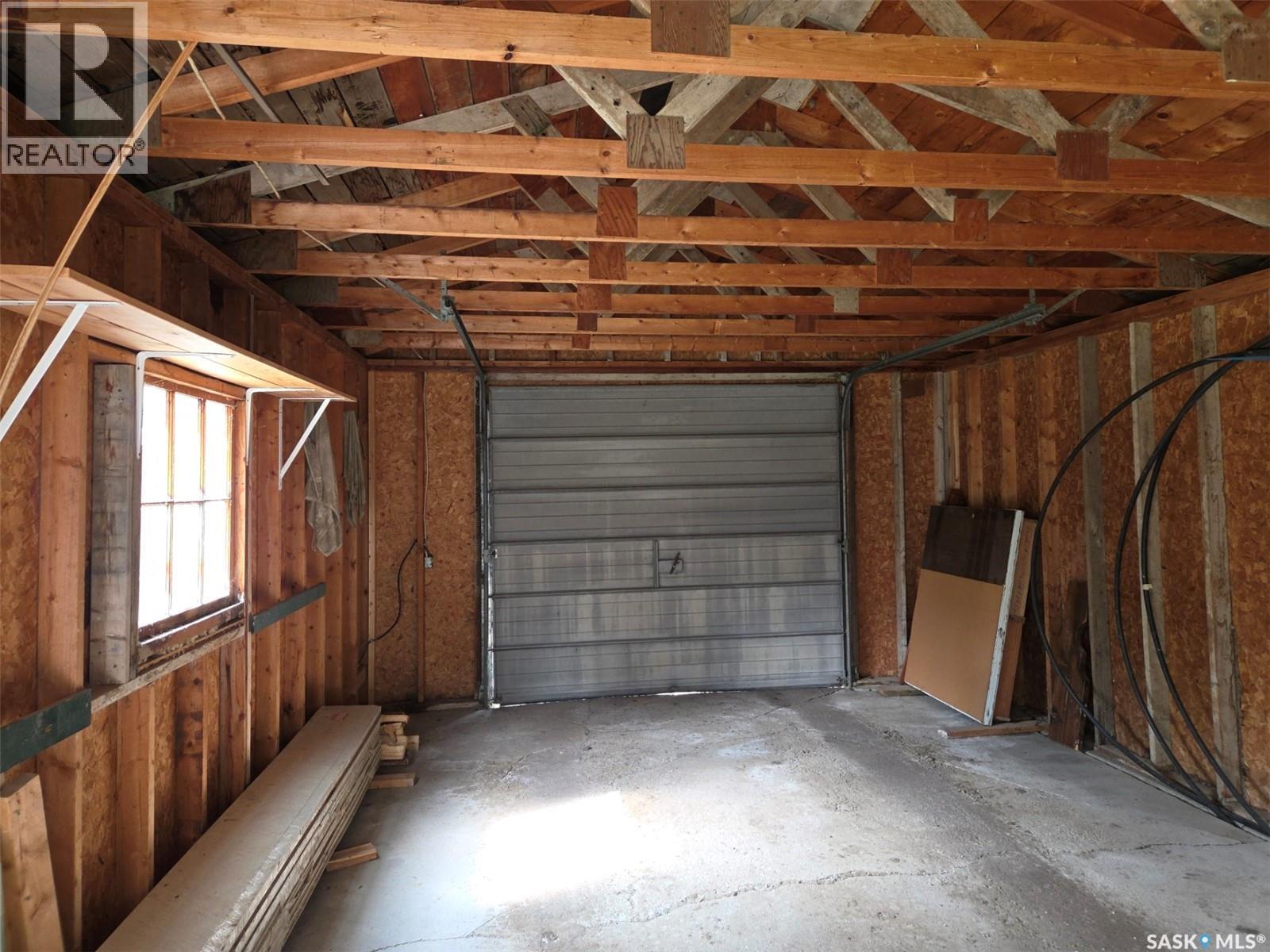 203 1St Street S, Middle Lake, SK - Indoor Photo Showing Garage