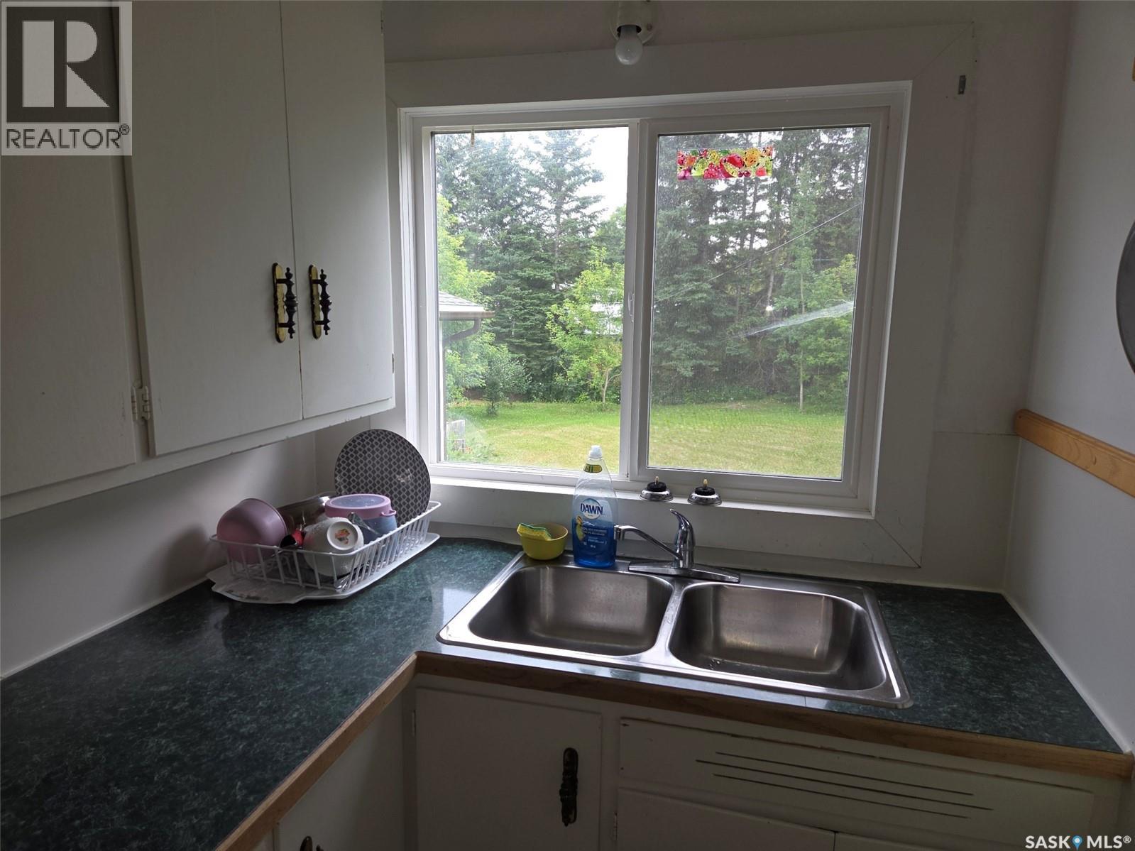 203 1St Street S, Middle Lake, SK - Indoor Photo Showing Kitchen With Double Sink
