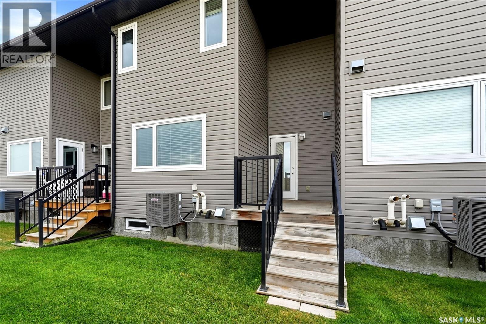 20 5301 Beacon Drive, Regina, SK - Outdoor With Deck Patio Veranda With Exterior