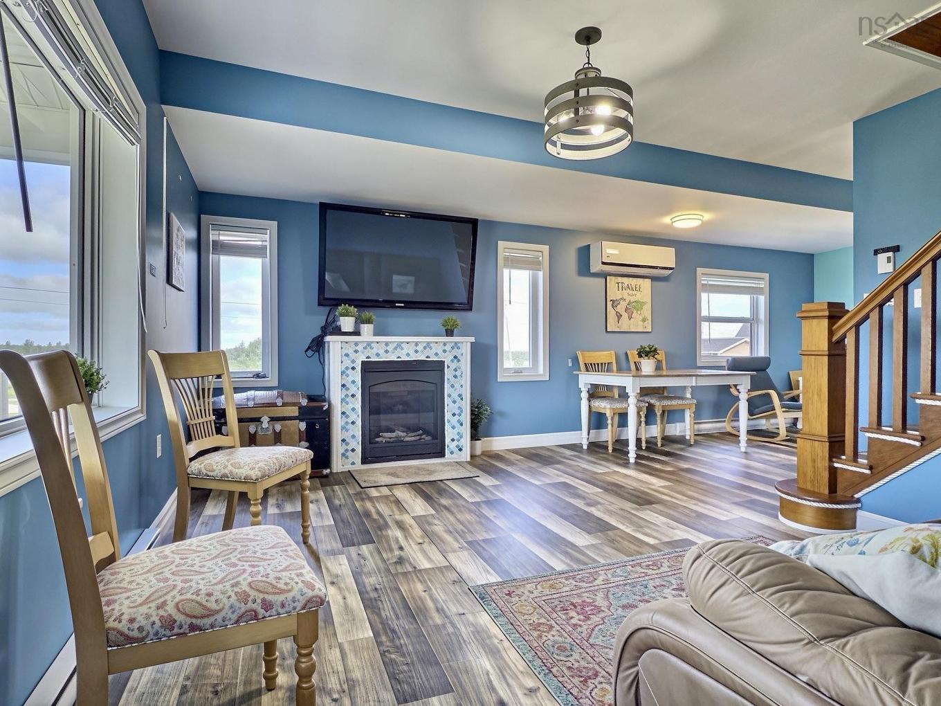 35 Chemin Broussard, Petit Étang, NS - Indoor Photo Showing Living Room With Fireplace
