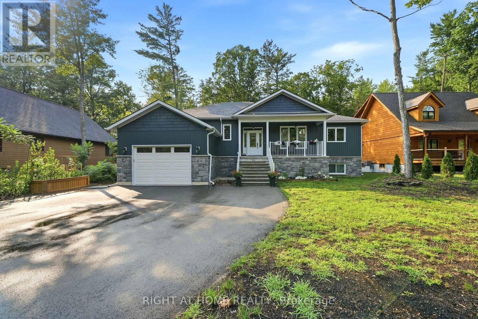 48 Nicole Boulevard, Tiny, ON - Outdoor With Deck Patio Veranda With Facade