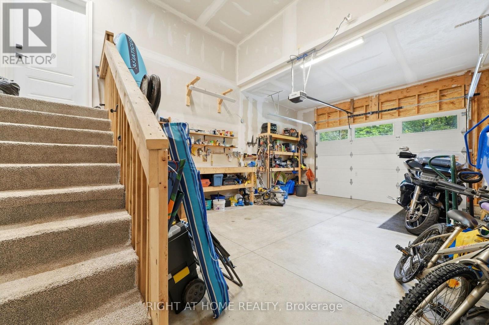 48 Nicole Boulevard, Tiny, ON - Indoor Photo Showing Garage