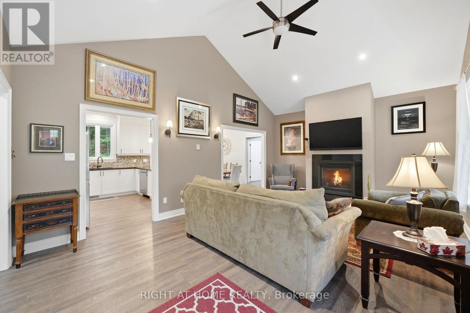 48 Nicole Boulevard, Tiny, ON - Indoor Photo Showing Living Room With Fireplace