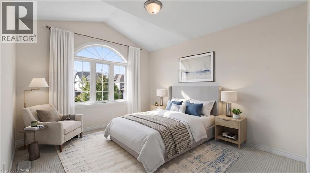 Vaulted ceiling, arched window, neutral wall tones, light-toned carpeting, recessed ceiling light fixture - 242 Moorlands Crescent, Kitchener, ON - Indoor Photo Showing Bedroom