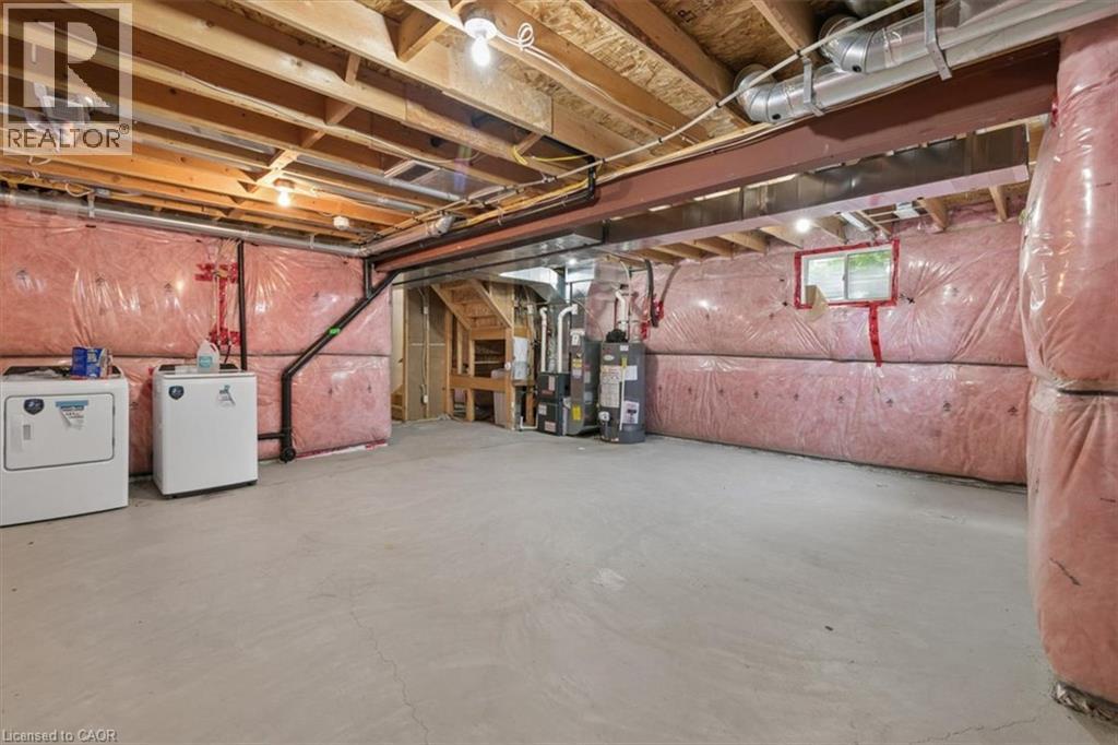 Unfinished basement with concrete flooring, exposed ceiling joists, and insulated perimeter walls - 242 Moorlands Crescent, Kitchener, ON - Indoor